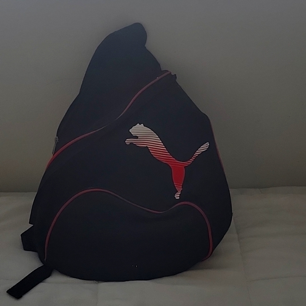 Backpack - cross body, over shoulder style